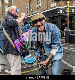 Musikern in der Londoner Portobello Road Market Stockfoto