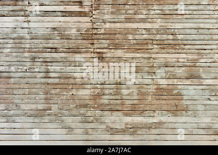 Hintergrund der Holzbretter mit den Resten der Peeling weiße Farbe. Textur. Stockfoto