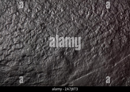 Moody dunkle schwarze Höhle wand Textur. Nahaufnahme Hintergrund Stockfoto