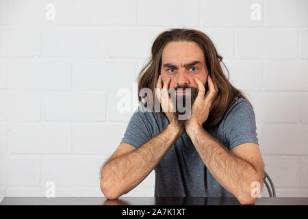 frustrierte junge Mann Stockfoto