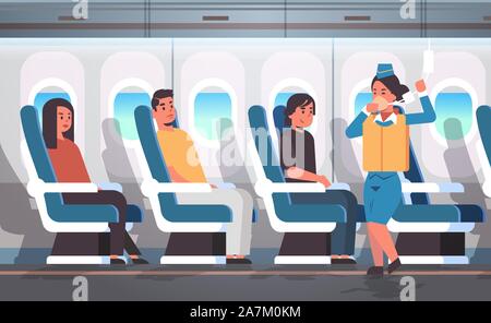 Stewardess erklärt Sicherheitshinweise mit Schwimmweste für Passagiere Flight Attendant demonstrieren, wie Sauerstoff Maske im Notfall moderne Flugzeug board Innere horizontale Vektor Illustration zu verwenden Stock Vektor