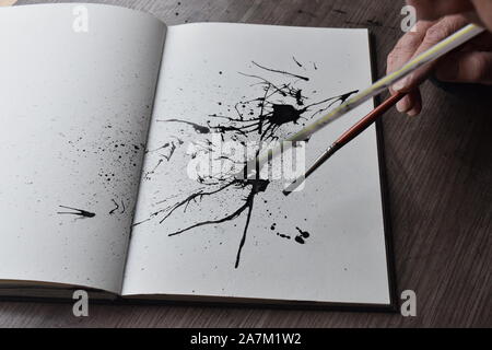 Tinte wird von Stroh auf Papier geblasen, Reihe von pics in einer Sequenz. Stockfoto