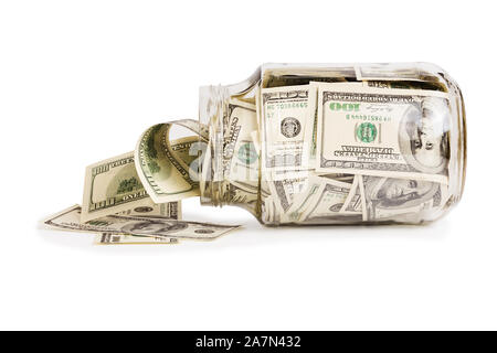 Glas Glas voller Hundert us Dollar Banknoten Festlegung auf der Seite - auf weißem Hintergrund Stockfoto