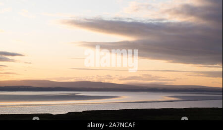 Sonnenaufgang über Morecambe Bay. Grange Over Sands Cumbria Stockfoto