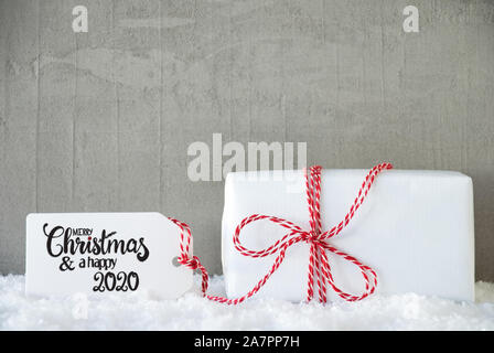 Ein Geschenk zu Weihnachten, Schnee, Zement, frohe Weihnachten und ein gutes Jahr 2020 Stockfoto
