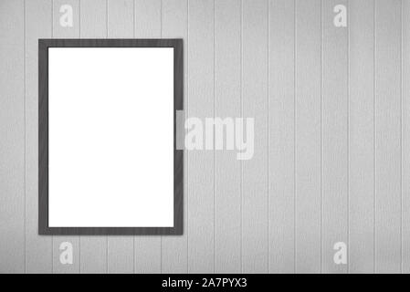 Leere leere weiße Mock up Bilderrahmen Board auf grau Holz Paneele Wand Hintergrund. Stockfoto