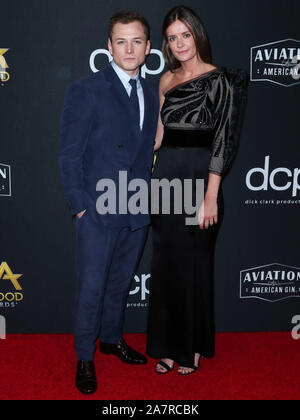 Beverly Hills, Vereinigte Staaten. 03 Nov, 2019. Schauspieler Taron Egerton und Freundin Emily Thomas kommen bei der 23. jährlichen Hollywood Film Awards im Beverly Hilton Hotel am 3. November 2019 in Beverly Hills, Los Angeles, Kalifornien, USA. (Foto von Xavier Collin/Image Press Agency) Stockfoto