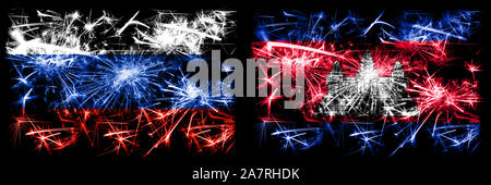Russland, Russische vs Kambodscha, kambodschanischen Neujahrsfest funkelnden Feuerwerk flags Konzept Hintergrund. Kombination von zwei Staaten Fahnen. Stockfoto