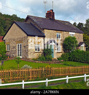 York Stone Cottages in Hutton-le-Hole Dorf am Rande der North York Moors, Yorkshire, England, Großbritannien Stockfoto