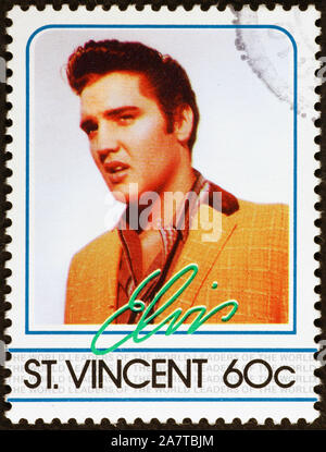 Portrait von Elvis Presley auf Briefmarke von Saint Vincent Stockfoto