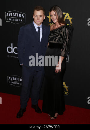 Beverly Hills, Kalifornien - 03.November 2019: (L-R) Taron Egerton und Emily Thomas die 23. jährliche Hollywood Film Awards im Beverly Hilton Hot teilnehmen Stockfoto