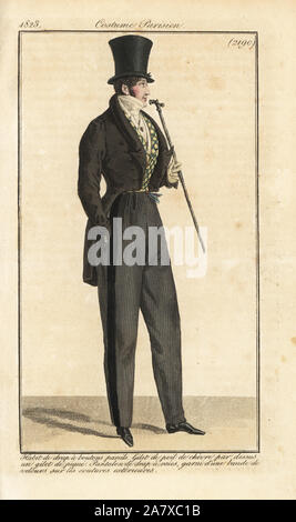 Mann, die Mode 1823: Wolle, ziegenfell Gilet (Weste) über dreilagig Gilet, Gestreifte Hose mit Wolle samt Band auf die äußere Naht. Papierkörbe Kupferstich von Zeitschrift für Damen und Mode, Journal des Dames et des Modes, Paris, 1823. Stockfoto