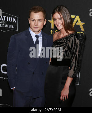 Beverly Hills, Kalifornien - 03.November 2019: (L-R) Taron Egerton und Emily Thomas die 23. jährliche Hollywood Film Awards im Beverly Hilton Hot teilnehmen Stockfoto