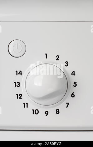 Haushaltsgeräte Konzept. Ein Teil der Waschmaschine Control Panel. Programm Auswahl Knopf. Stockfoto