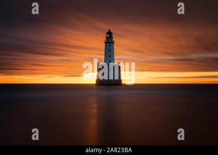 Rattray Head Lighthouse in Sunrise Licht, Ostküste Schottlands Stockfoto