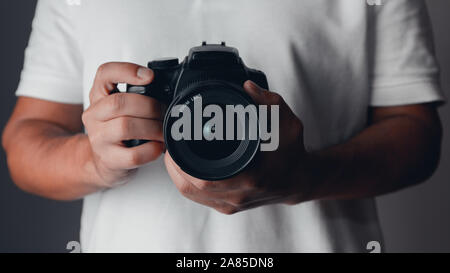 Fotograf mit einer digitalen Kamera Stockfoto