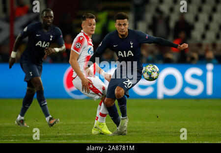 Belgrad. 6 Nov, 2019. Tottenham Hotspur der Dele Alli (R) Mias mit Crvena Zvezda Petrovic Njegos während der UEFA Champions League Gruppe B Fußballspiel zwischen Crvena Zvezda und Tottenham Hotspur in Belgrad, Serbien an November 6, 2019. Credit: Predrag Milosavljevic/Xinhua/Alamy leben Nachrichten Stockfoto