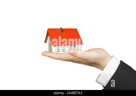 Hand mit Einfamilienhaus, Freisteller, weisser Hintergrund, Stockfoto