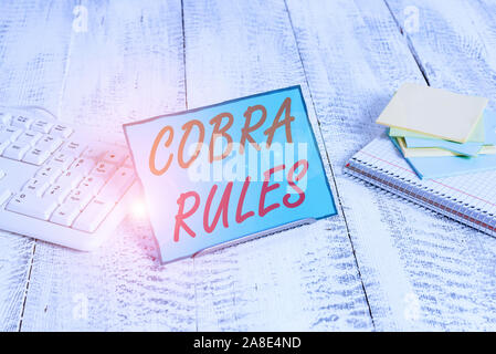 Wort schreiben Text Cobra Regeln. Business Foto präsentiert die Gruppe Krankenversicherung nach einem Job Verlust Briefpapier stehen auf Puffer Draht in Stockfoto
