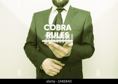 Wort schreiben Text Cobra Regeln. Business Foto präsentiert die Gruppe Krankenversicherung nach einem Job Verlust männlicher Mensch tragen formalen Arbeit Anzug Stockfoto
