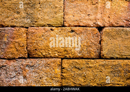 Die Wand aus Rot leuchtende Steine Stockfoto
