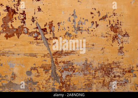 Alt, Vintage orange gestrichene Wand mit roter Farbe unten, gealtert, retro Hintergrund oder Textur Stockfoto