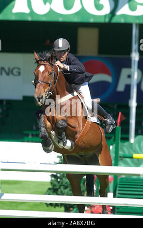 Die nationalen Spruce Meadows, Zeidler finanzielle Schale, Juni 2003, Richard Spooner (USA) Reiten Hilton Flug Stockfoto