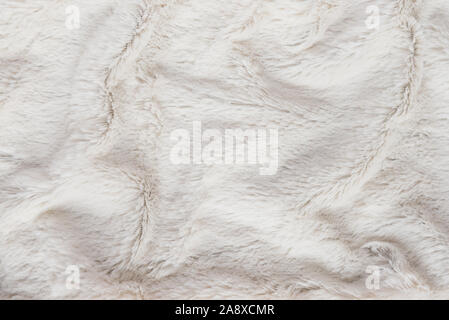 Weißen Pelzmantel Textur Hintergrund, künstliche Gewebe detail Stockfoto