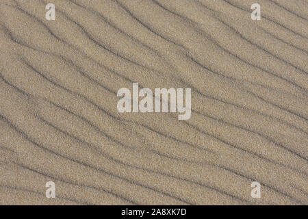 Weich fließende Strand Sand Wellen Stockfoto