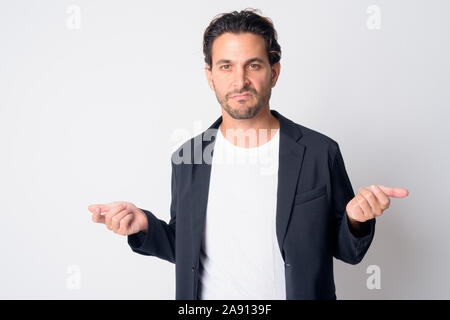 Portrait von betonte Spanischer Geschäftsmann auf der Suche verärgert mit erhobenen Armen Stockfoto
