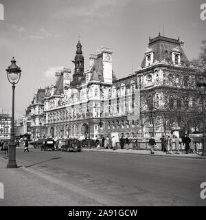 1950, historische, den großen französischen Gebäude des Hotel de Ville, Paris, Frankreich, dem Sitz der Pariser Stadtrat seit 1357. Im neo-renaissance Stil umgebaut, es ersetzt das ehemalige Rathaus, die während der Pariser Kommune im Jahre 1871 verbrannt. Stockfoto