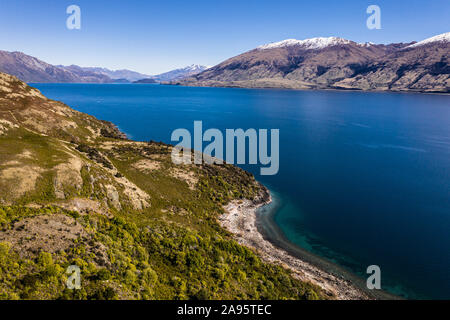 Einen atemberaubenden Blick auf den Lake Wakapitu in der Nähe von Queenstown in Neuseeland Südinsel im Frühjahr Stockfoto