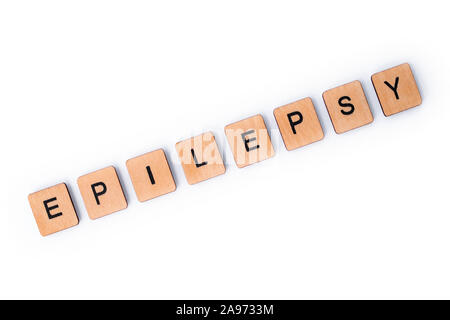 Das Wort Epilepsie, Dinkel mit hölzernen Buchstabensteine über einem weißen Hintergrund. Stockfoto