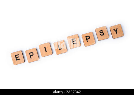 Das Wort Epilepsie, Dinkel mit hölzernen Buchstabensteine über einem weißen Hintergrund. Stockfoto