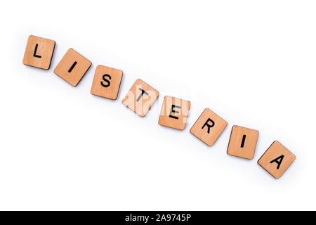 Das Wort Listerien, Dinkel mit hölzernen Buchstabensteine, über einen weißen Hintergrund. Stockfoto