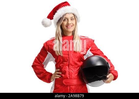 Weibliche Racer tragen ein Weihnachtsmann hat und halten einen Helm auf weißem Hintergrund Stockfoto