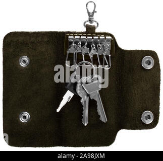 Ansicht von oben auf grünem Leder Schlüsselanhänger mit drei Tasten auf weißem Hintergrund Stockfoto