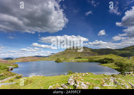 Cregennan Seen an einem sonnigen Tag im Snowdonia National Park, Wales Stockfoto