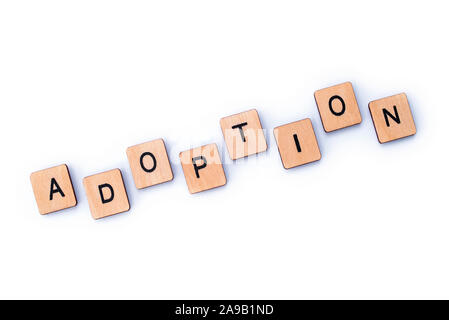 Das Wort "Annahme, Dinkel, mit hölzernen Buchstabensteine. Stockfoto