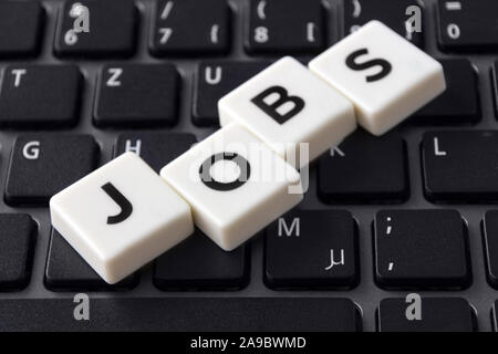 Jobs Symbol und Tastatur Hintergrund Stockfoto