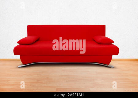 Rotes sofa Stockfoto