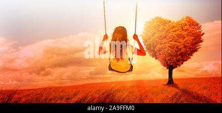 Mädchen rockt in eine surreale Landschaft Stockfoto