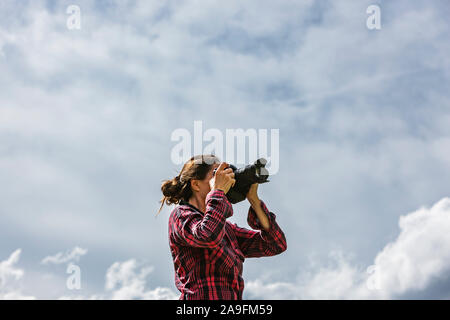 Fotograf auf einem Berg Stockfoto