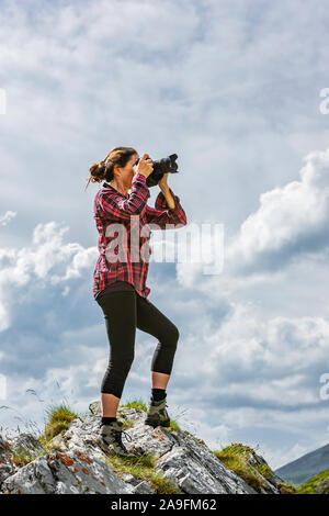 Fotograf auf einem Berg Stockfoto