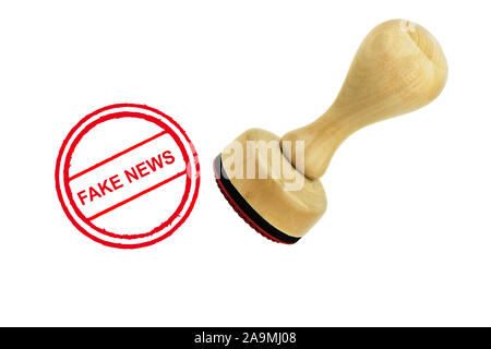 Deutsche Fake news Stempel auf Weiß Stockfoto