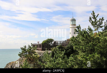 Leuchtturm am Haeundae Dongbaekseom Insel, Busan, Südkorea. Stockfoto