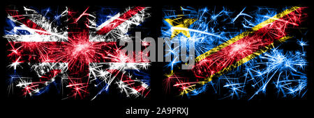 Großbritannien, United Kingdom vs. Demokratische Republik Kongo neues Jahr Feier reisen funkelnden Feuerwerk flags Konzept Hintergrund. Archetypische Stockfoto