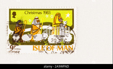 SEATTLE, Washington - 5. Oktober 2019: Insel Man Briefmarke für Weihnachten 1983 verwendet, mit Sternen, Schafe und 3 Hirten. Scot #252. Stockfoto