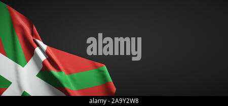 Flagge des Lappen des Baskenlandes auf dunklem Hintergrund Stockfoto