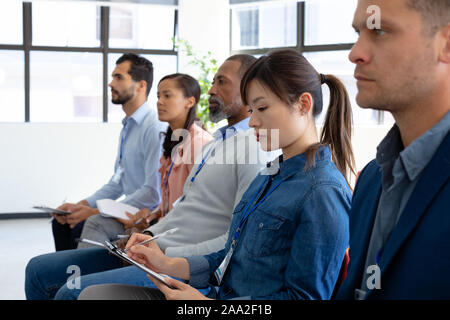 Geschäftsleute auf einer Konferenz Stockfoto